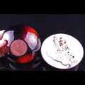 A pair of "Japanese"  enamelled copper dishes with "naked raku"