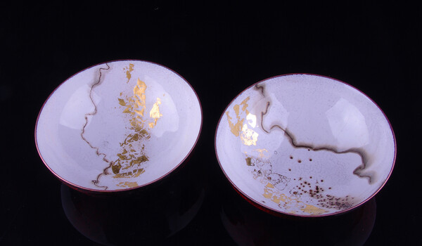 A pair of "Japanese"  enamelled copper dishes with "naked raku"