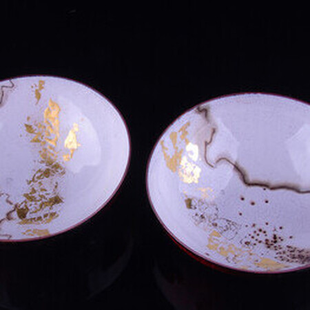 A pair of "Japanese"  enamelled copper dishes with "naked raku"