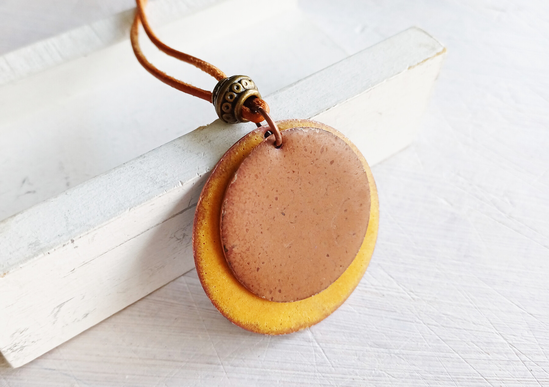 Brown and yellow pendant