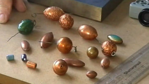 Enamelling beads and shaping copper